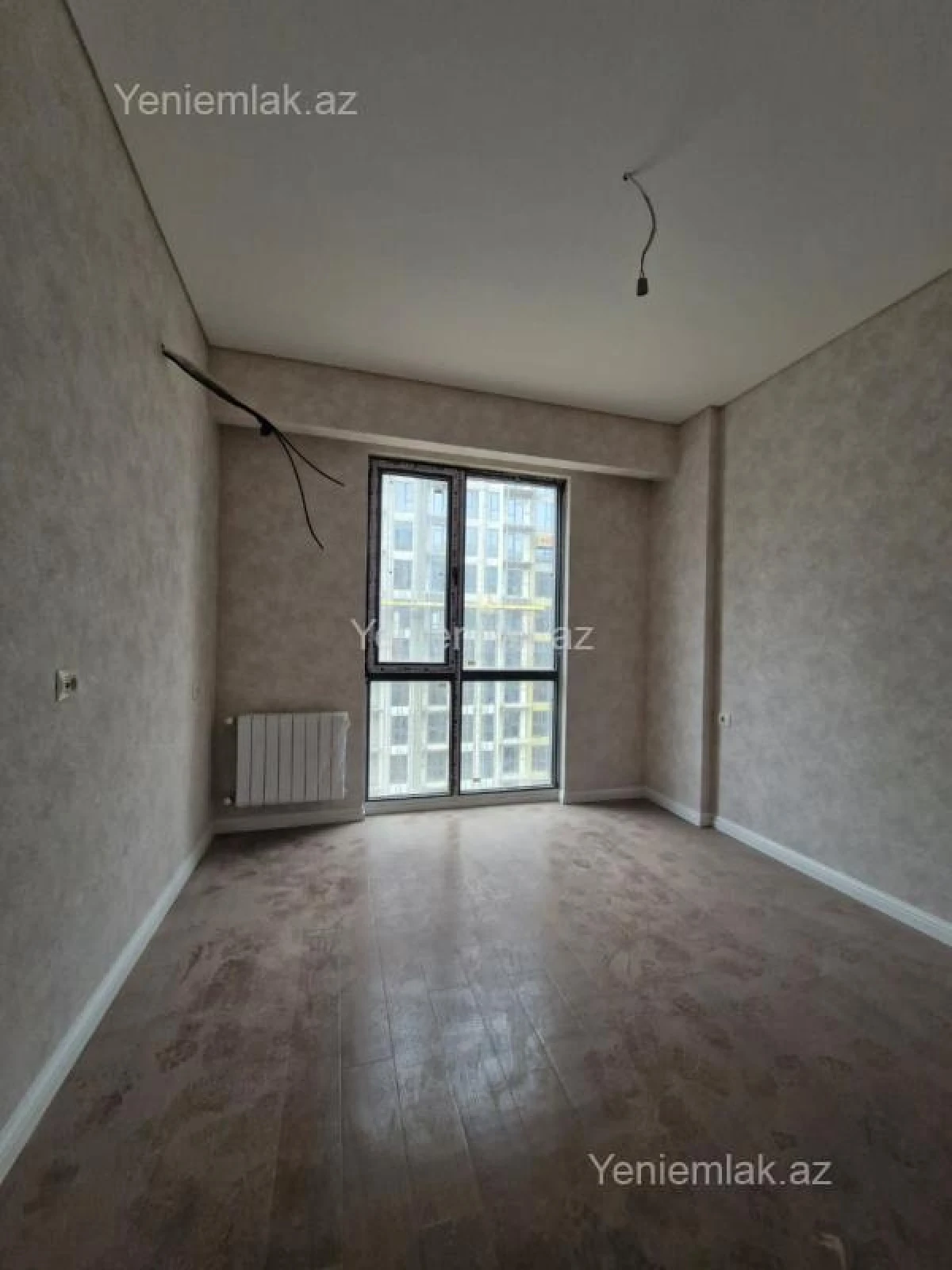Satılır 2 otaqlı yeni tikili 64 m²