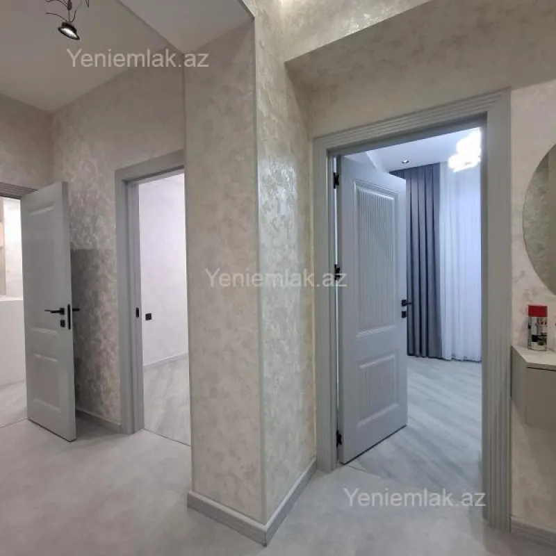 Satılır 2 otaqlı yeni tikili 64 m²