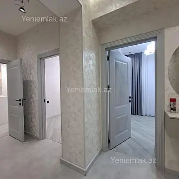 Satılır 2 otaqlı yeni tikili 64 m²