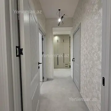 Satılır 2 otaqlı yeni tikili 64 m²