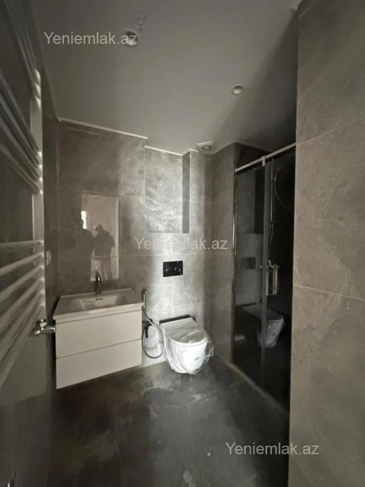 Satılır 2 otaqlı yeni tikili 63.99 m²