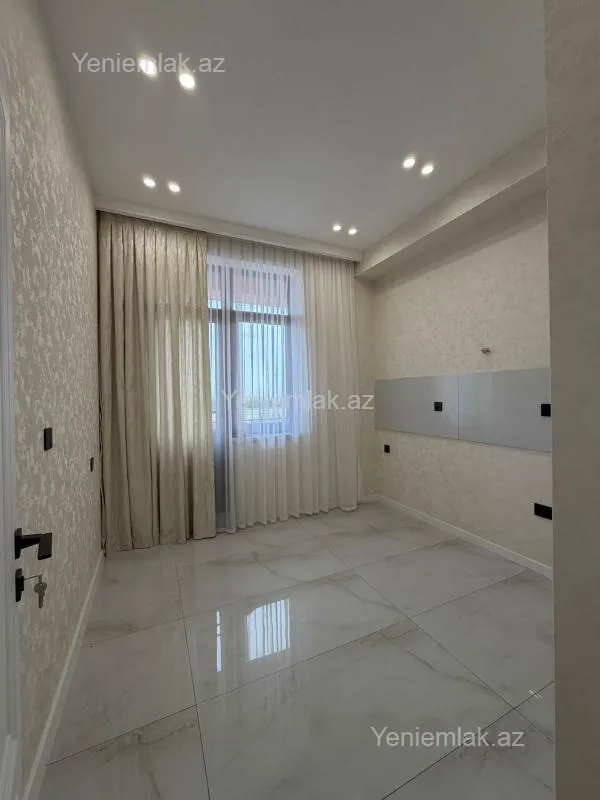 Satılır 2 otaqlı yeni tikili 60 m²