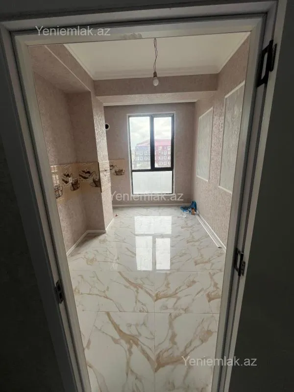 Satılır 2 otaqlı yeni tikili 56 m²