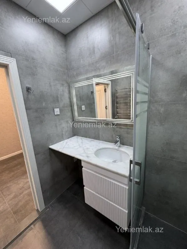 Satılır 2 otaqlı yeni tikili 61 m²