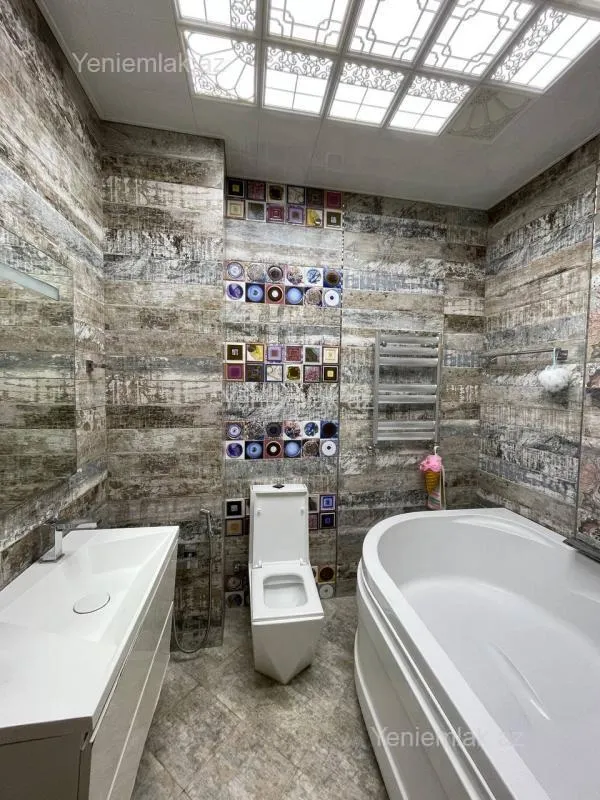 Satılır 4 otaqlı yeni tikili 180 m²