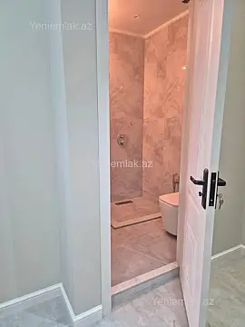 Satılır 2 otaqlı yeni tikili 55 m²