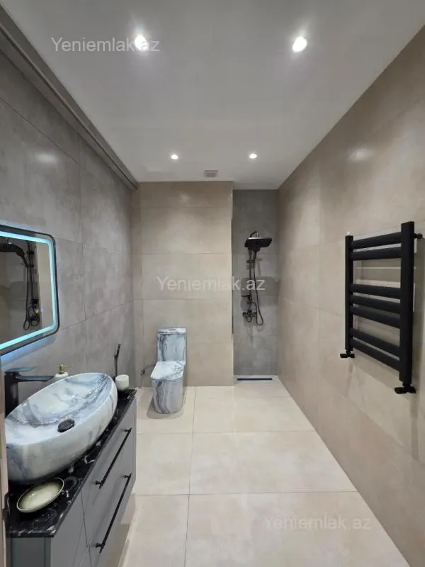 Satılır 2 otaqlı yeni tikili 60 m²