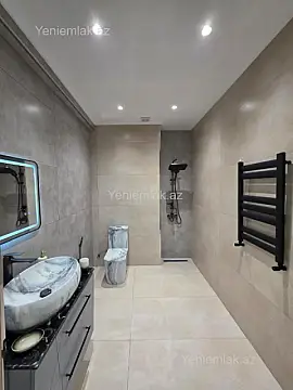 Satılır 2 otaqlı yeni tikili 60 m²