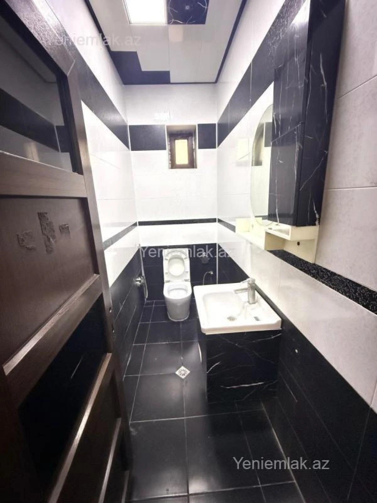 Satılır 9 otaqlı həyət evi 450 m²