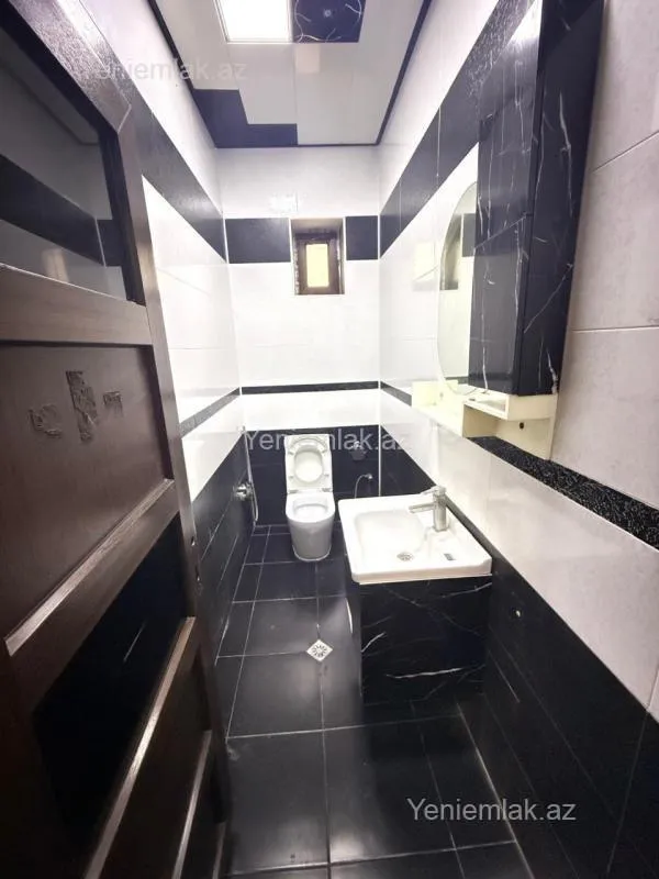 Satılır 9 otaqlı həyət evi 450 m²