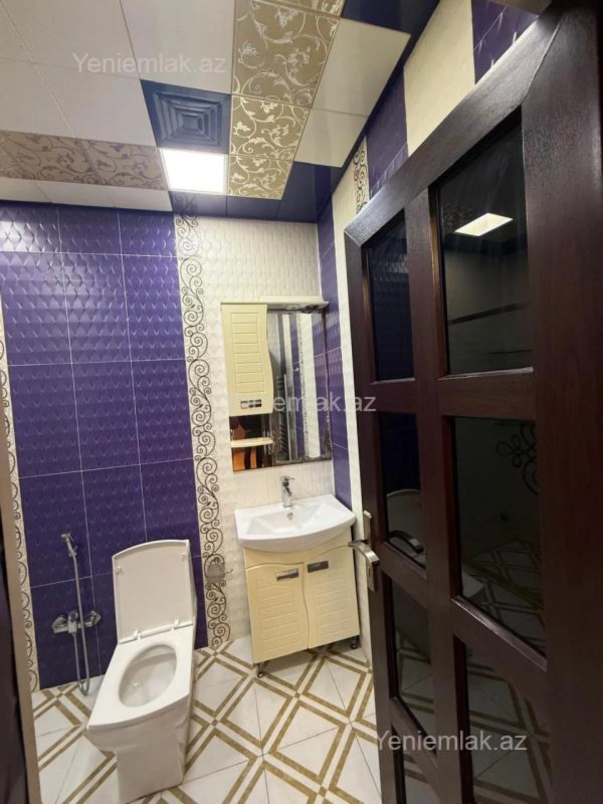 Satılır 9 otaqlı həyət evi 450 m²