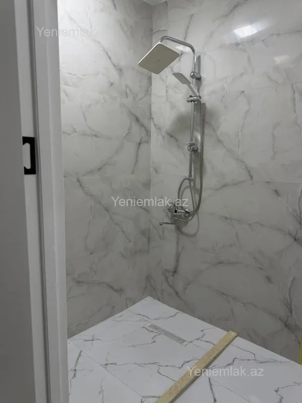 Satılır 2 otaqlı yeni tikili 55 m²