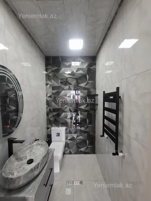 Satılır 3 otaqlı yeni tikili 128 m²