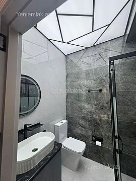 Satılır 2 otaqlı yeni tikili 55 m²