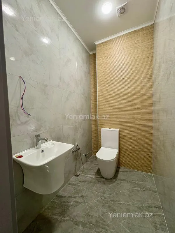 Satılır 2 otaqlı yeni tikili 82.5 m²