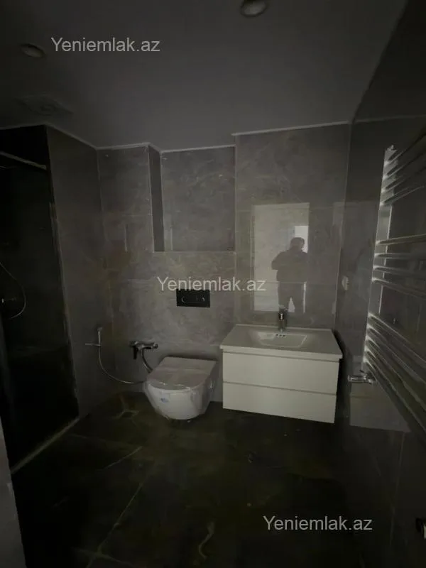 Satılır 2 otaqlı yeni tikili 64 m²