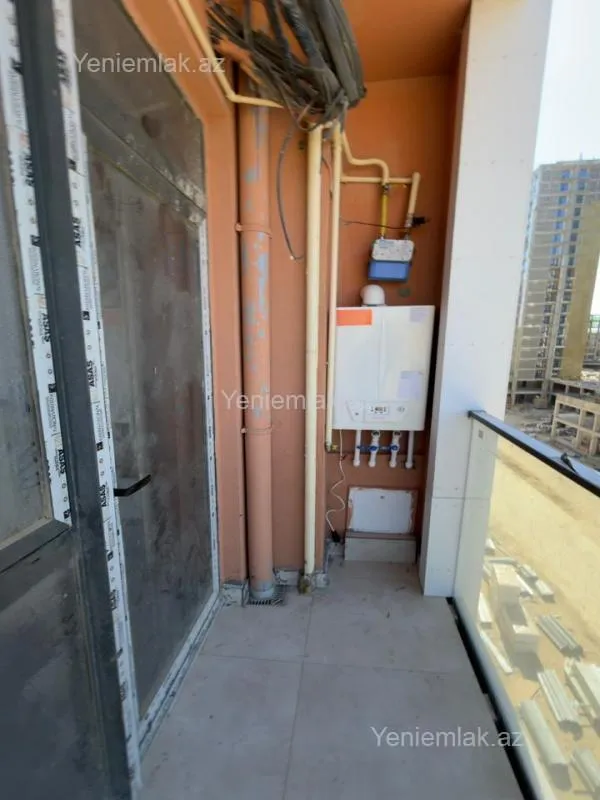 Satılır 2 otaqlı yeni tikili 64 m²