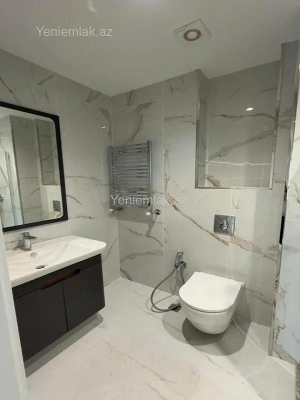 Satılır 2 otaqlı yeni tikili 63 m²