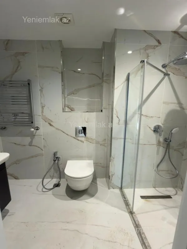 Satılır 2 otaqlı yeni tikili 63 m²