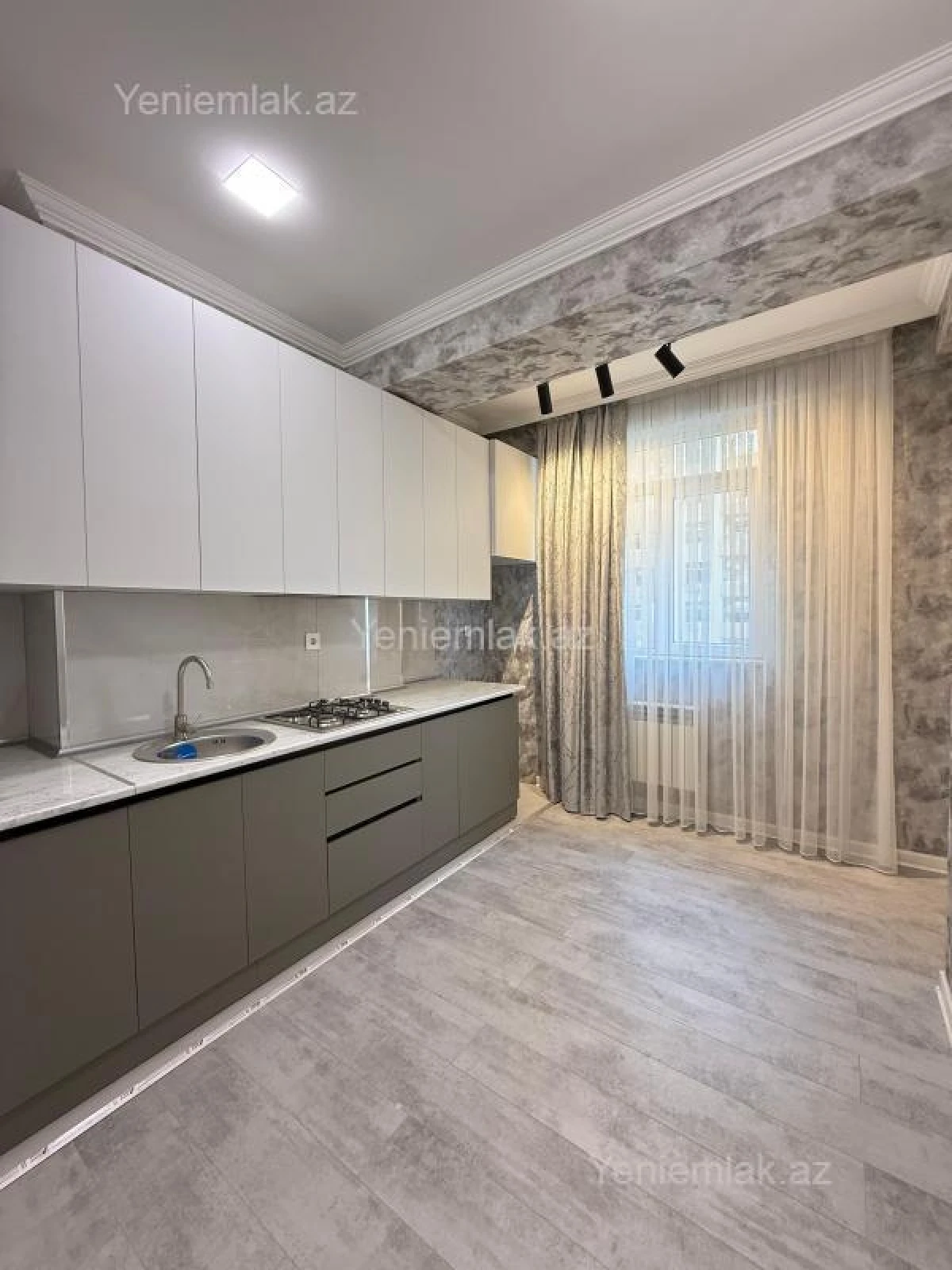 Satılır 2 otaqlı yeni tikili 75.6 m²