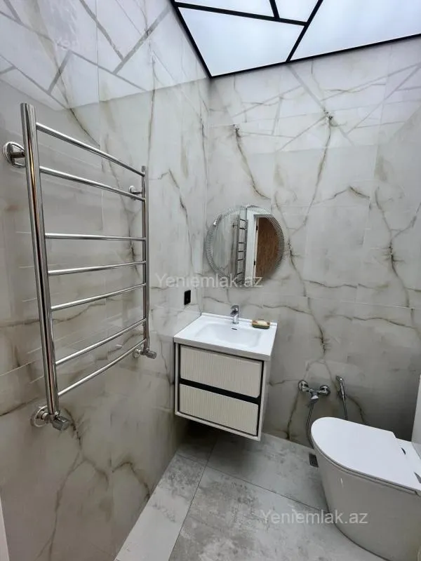 Satılır 3 otaqlı yeni tikili 98 m²