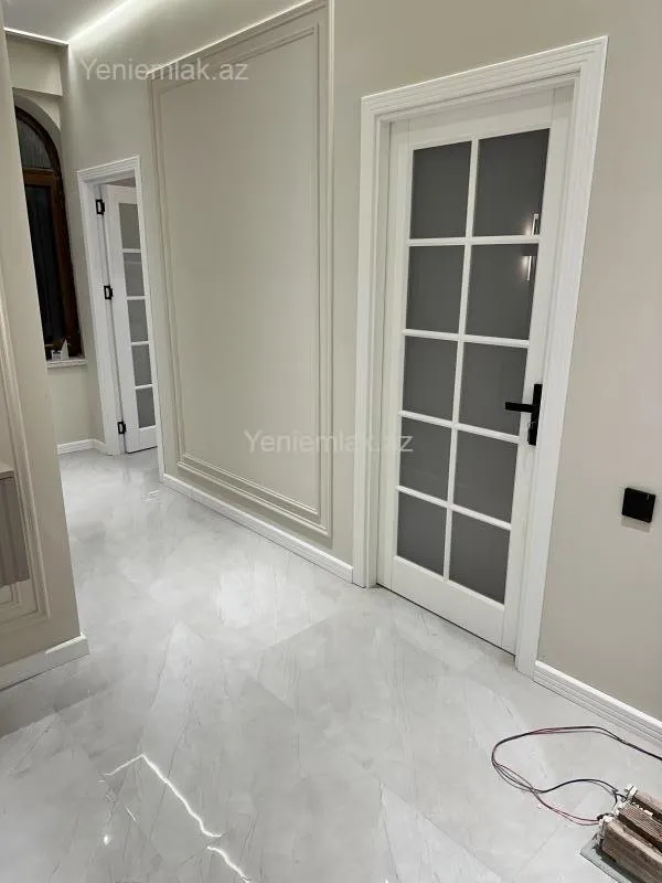 Satılır 3 otaqlı yeni tikili 100 m²