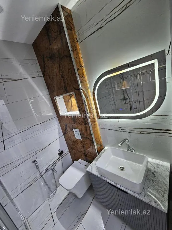 Satılır 2 otaqlı yeni tikili 60 m²