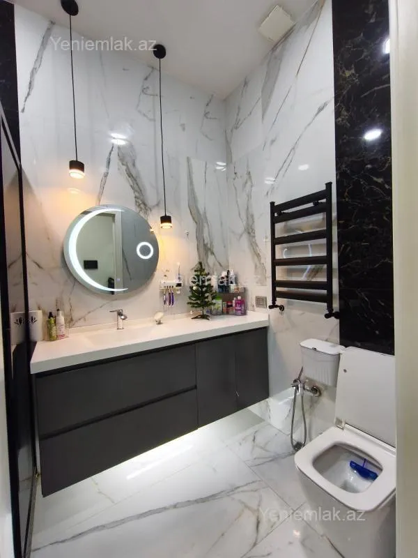 Satılır 3 otaqlı yeni tikili 97.2 m²