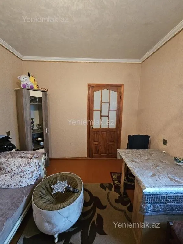 Satılır 1 otaqlı köhnə tikili 64 m²