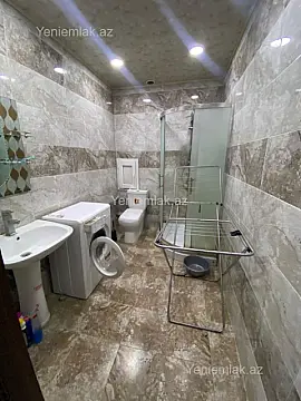 Satılır 2 otaqlı yeni tikili 64 m²