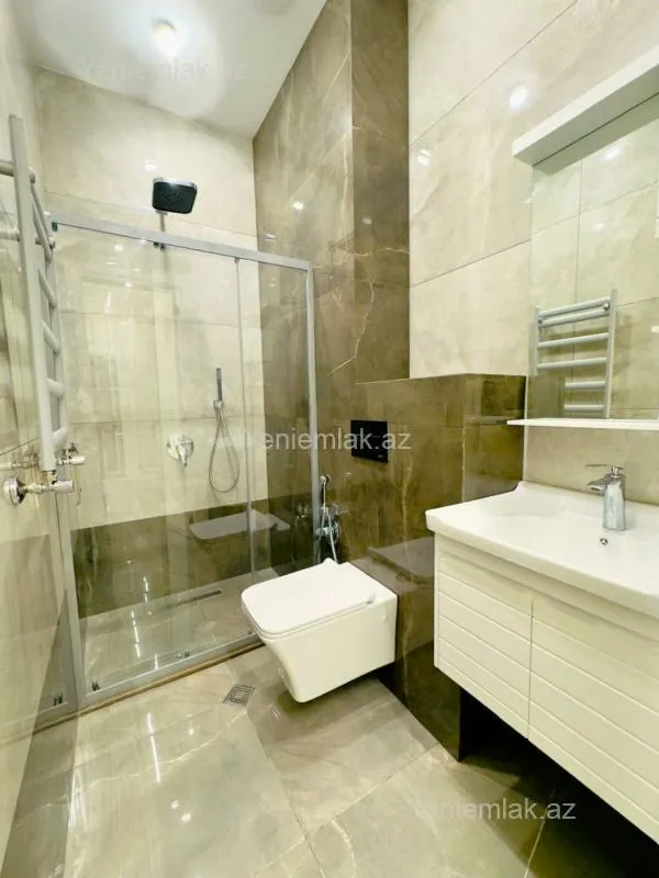 Satılır 2 otaqlı yeni tikili 60 m²