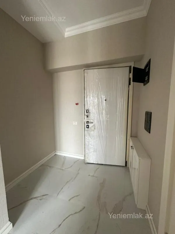 Satılır 2 otaqlı yeni tikili 60 m²
