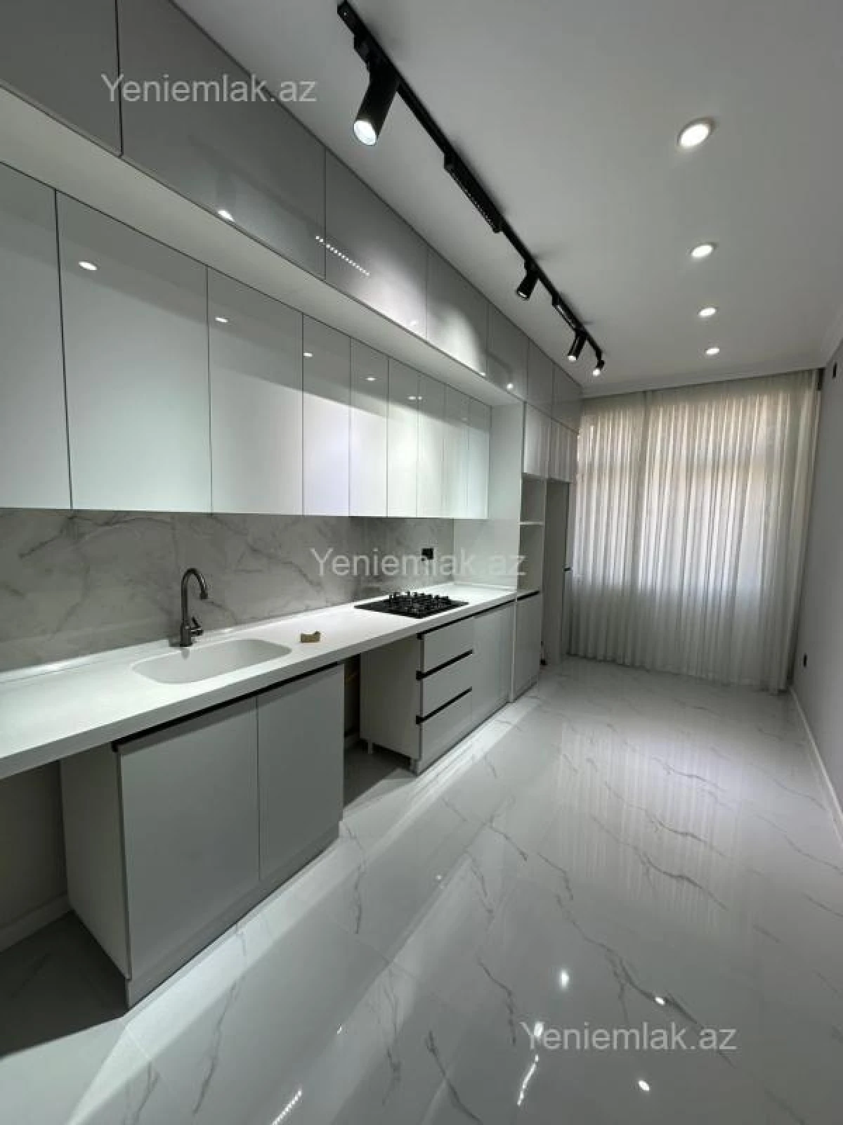 Satılır 3 otaqlı yeni tikili 100 m²