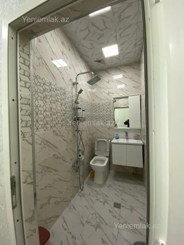 Satılır 2 otaqlı yeni tikili 60 m²