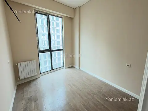 Satılır 2 otaqlı yeni tikili 64 m²