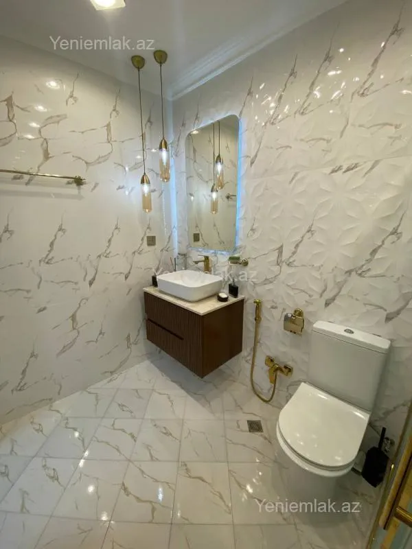 Satılır 3 otaqlı yeni tikili 125 m²