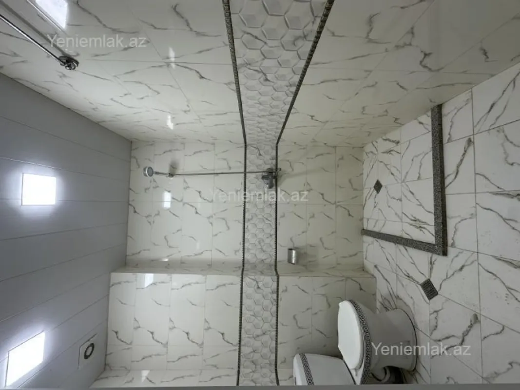 Satılır 2 otaqlı yeni tikili 60 m²