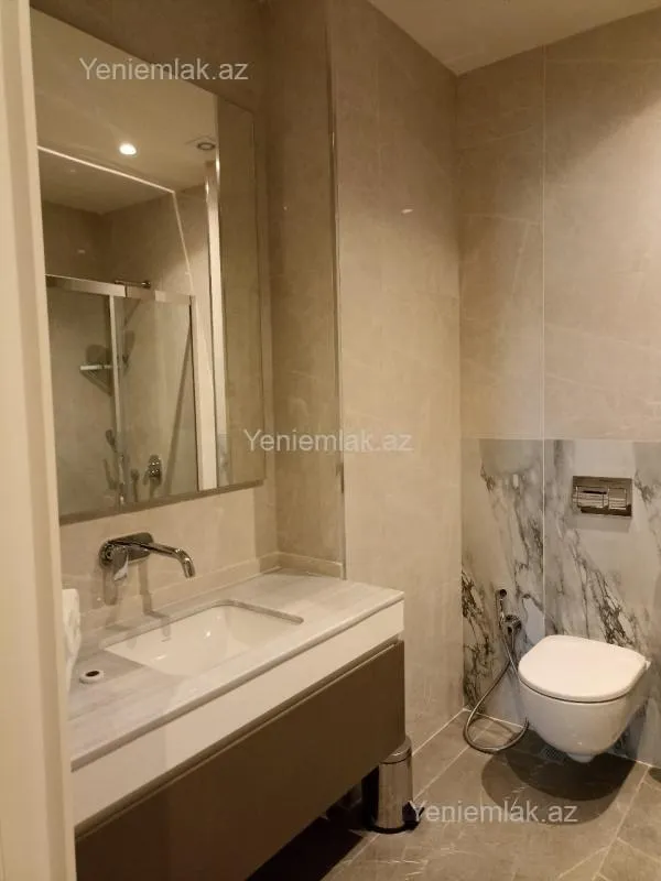 Satılır 2 otaqlı yeni tikili 99 m²