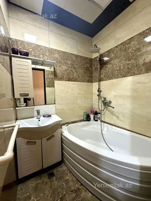 Satılır 3 otaqlı yeni tikili 100 m²