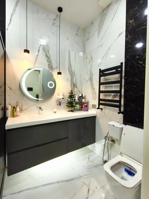 Satılır 3 otaqlı yeni tikili 100 m²