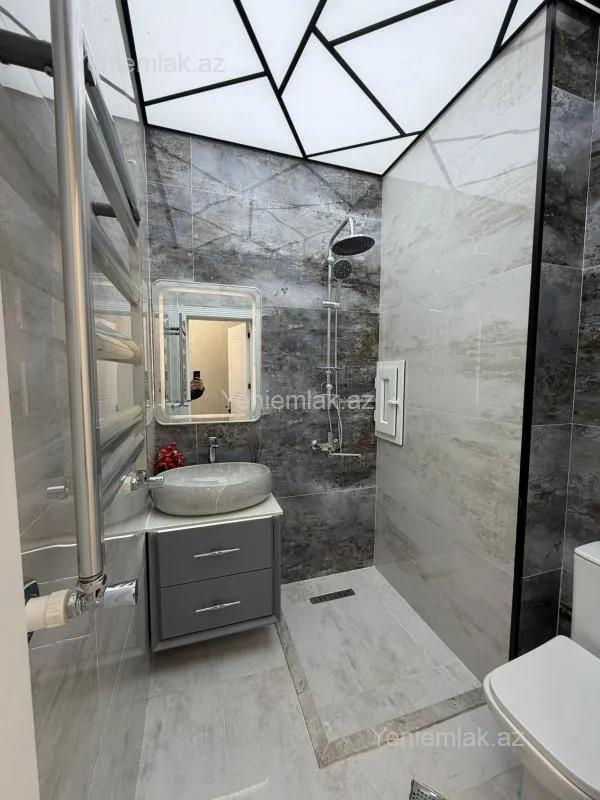 Satılır 2 otaqlı yeni tikili 55 m²