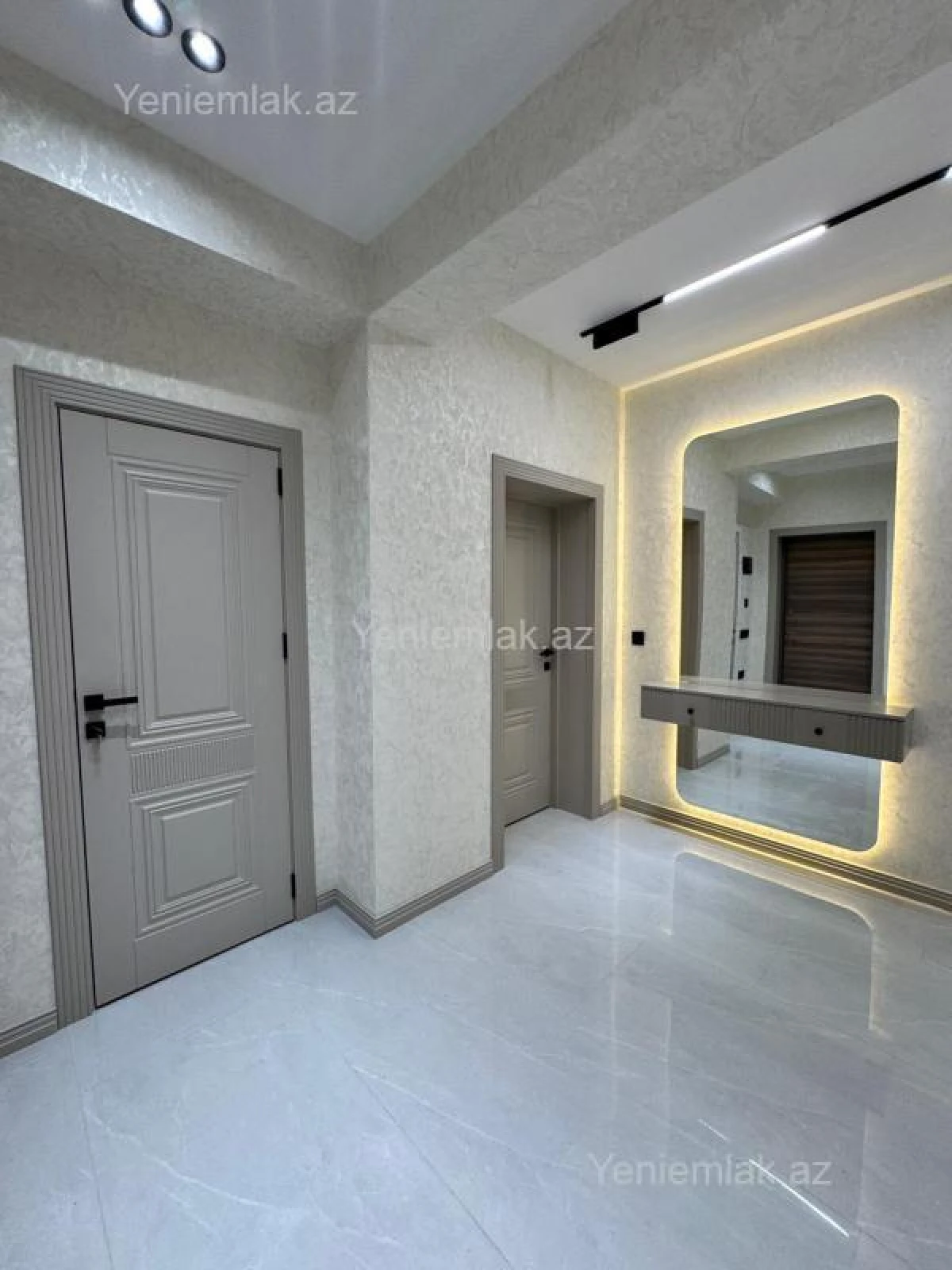 Satılır 2 otaqlı yeni tikili 55 m²