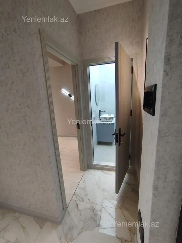 Satılır 2 otaqlı yeni tikili 55 m²