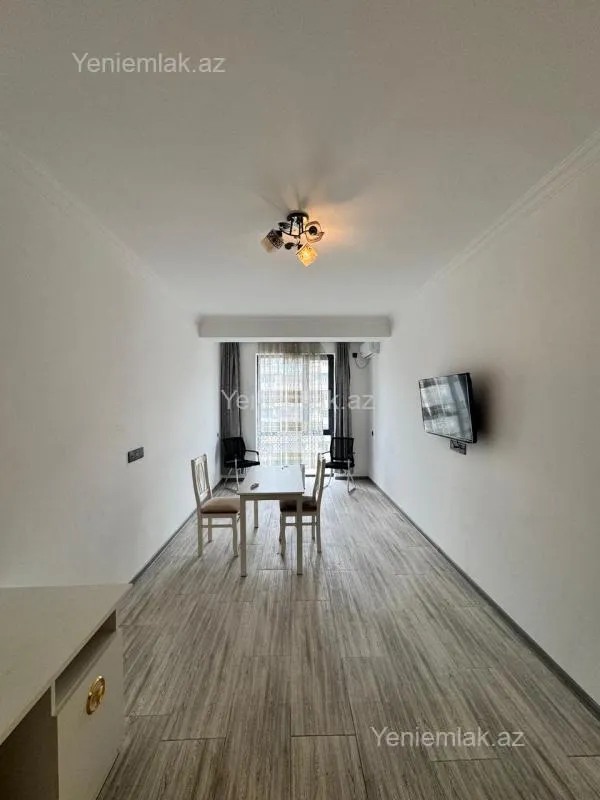 Satılır 2 otaqlı yeni tikili 55 m²