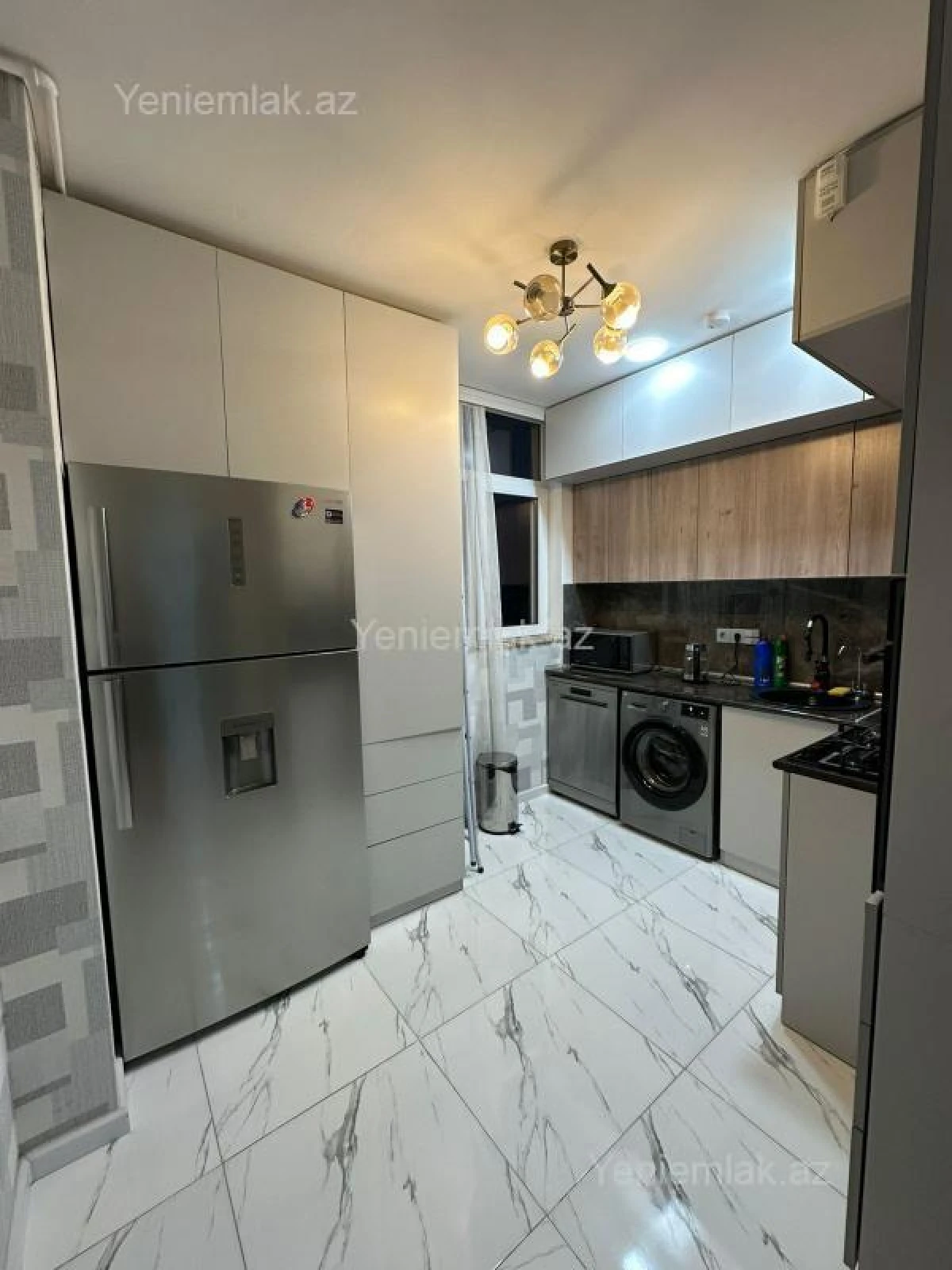 Satılır 2 otaqlı yeni tikili 60 m²