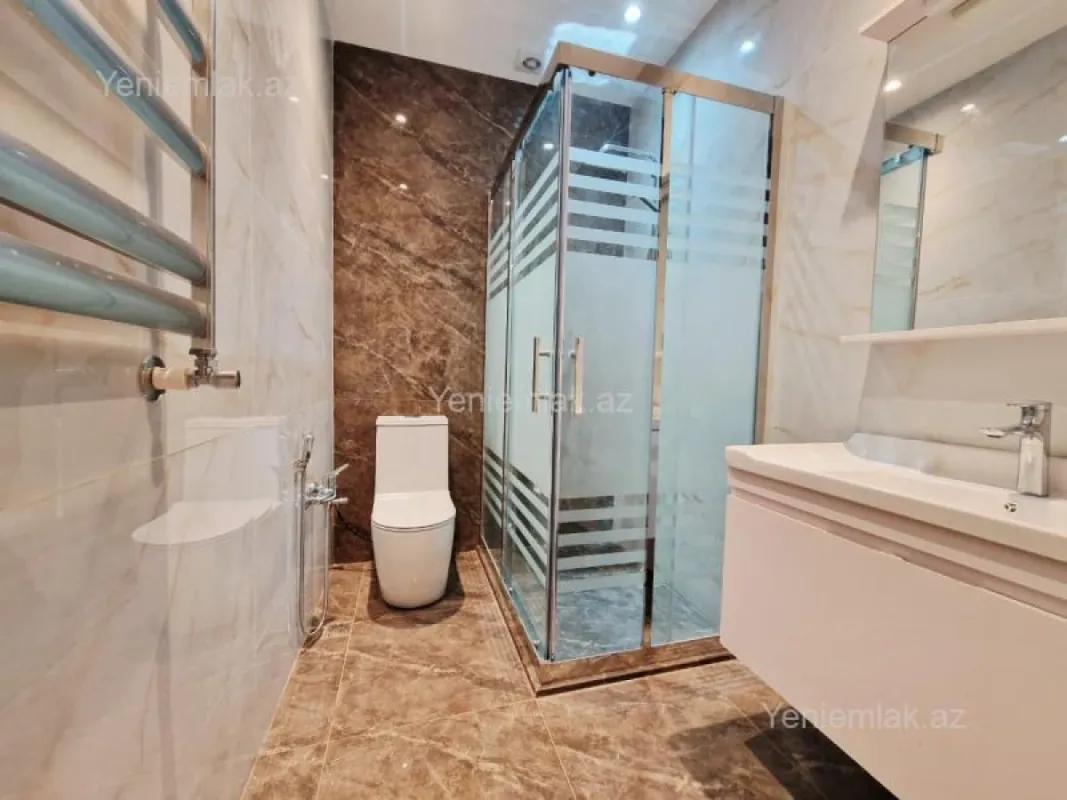 Satılır 2 otaqlı yeni tikili 63 m²