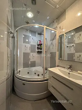 Satılır 3 otaqlı yeni tikili 100 m²