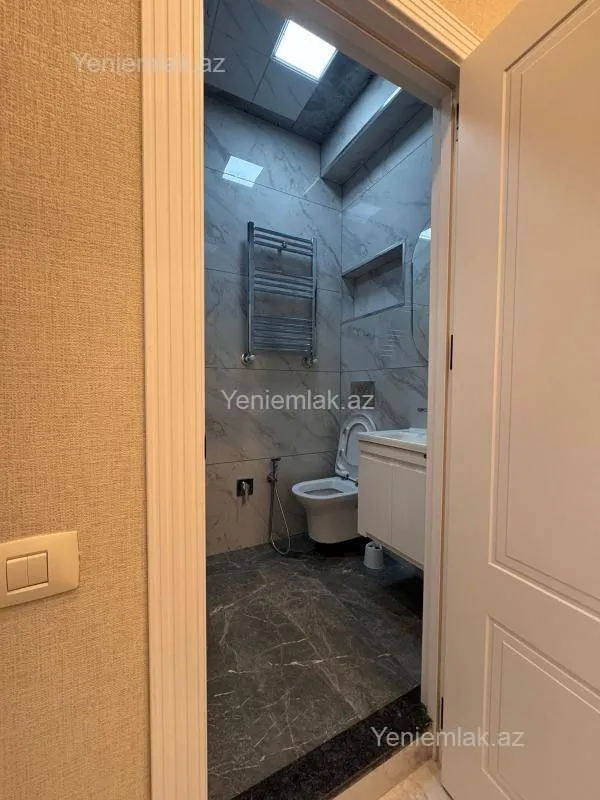 Satılır 2 otaqlı yeni tikili 60 m²