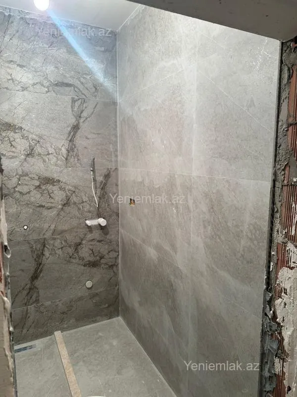 Satılır 2 otaqlı yeni tikili 75.5 m²