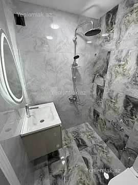 Satılır 2 otaqlı yeni tikili 64 m²